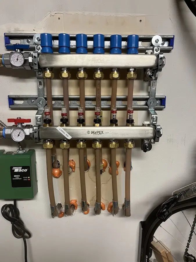 Plumber performing Gas Line Installation at a residential property in Montclair